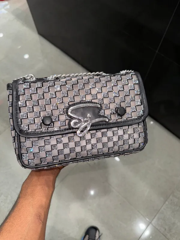 Diamond Check Purse 1 of 1 sold by Shane Justin