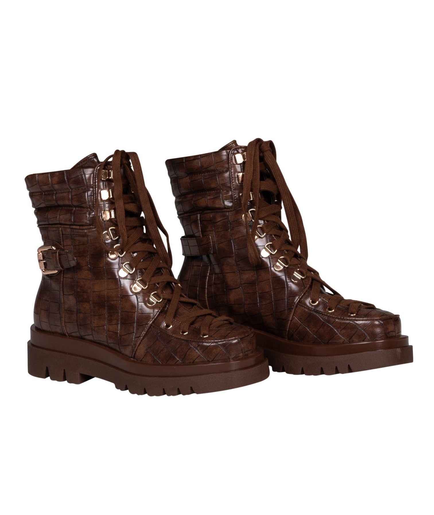 Chocolate Boots sold by Shane Justin