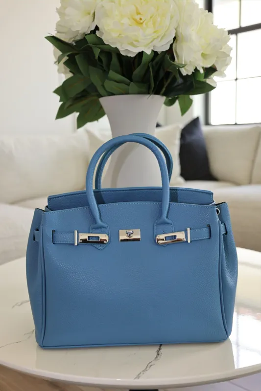 Justin 30 Denim Blue sold by Shane Justin