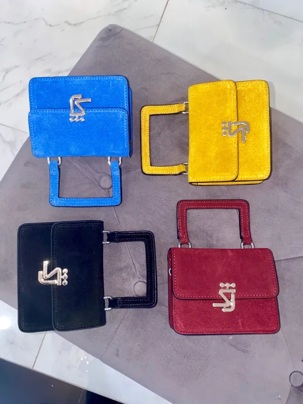 Suede Mini sold by Shane Justin