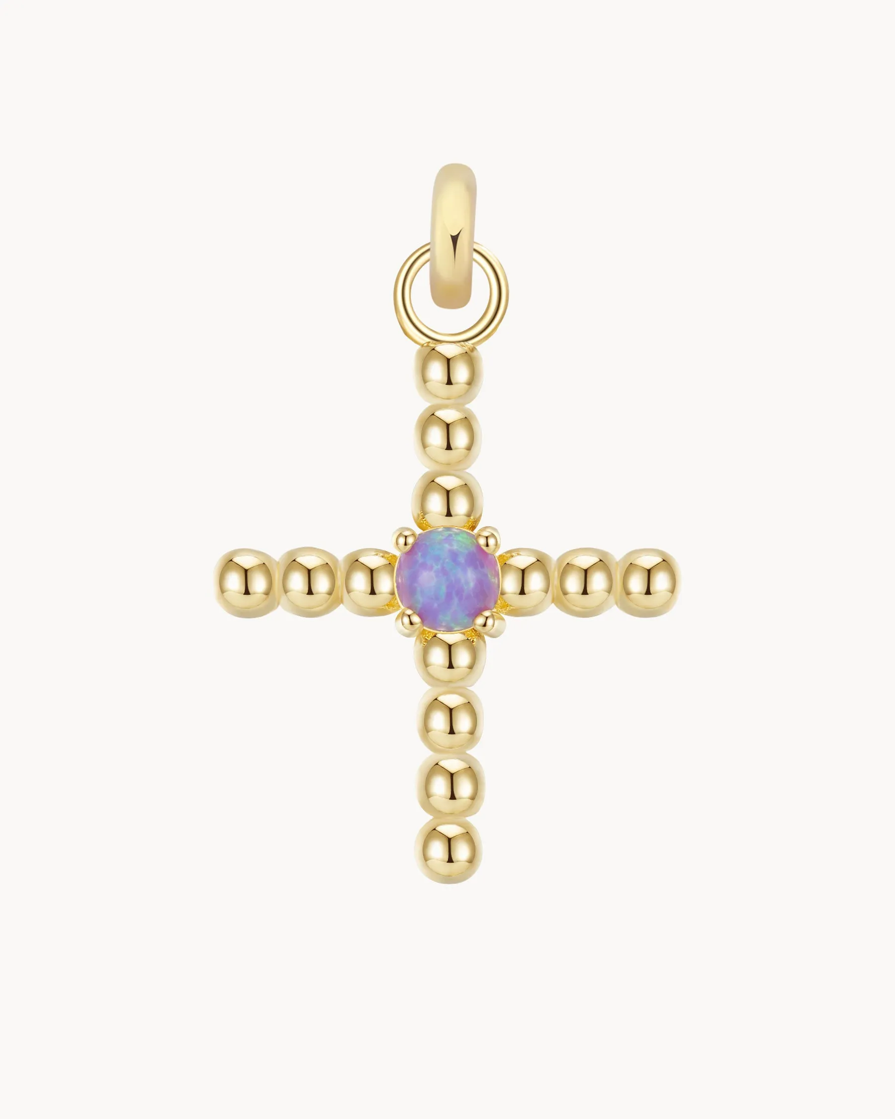 Opal Cross Charm sold by Apodemia