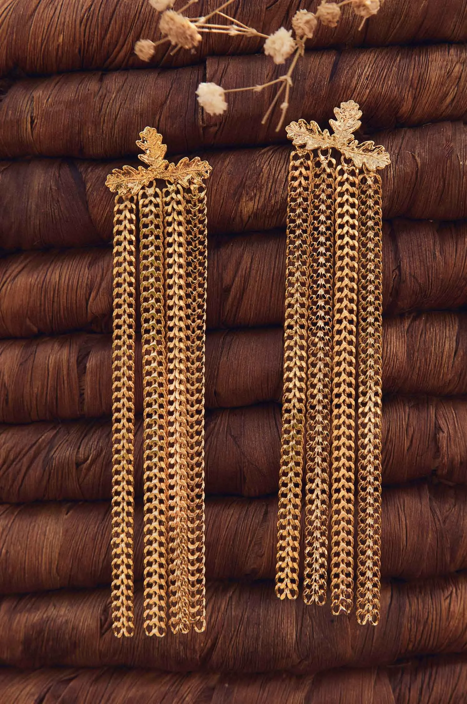 Long chain earrings into the woods sold by Apodemia