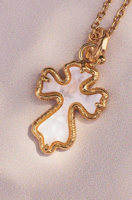 Charm cruz de nacar sold by Apodemia