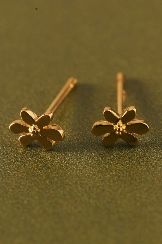 Mini pearl earrings sold by Apodemia