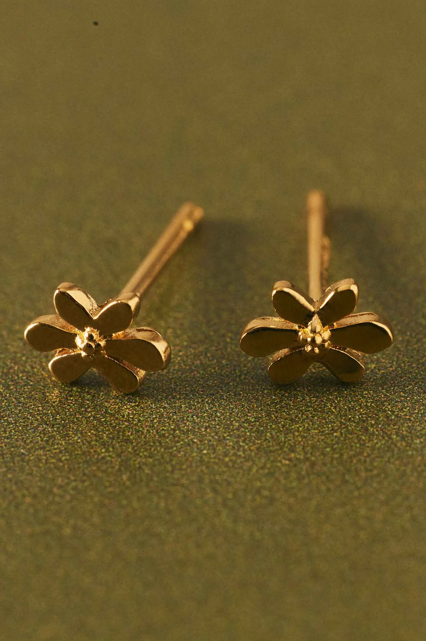 Mini pearl earrings sold by Apodemia