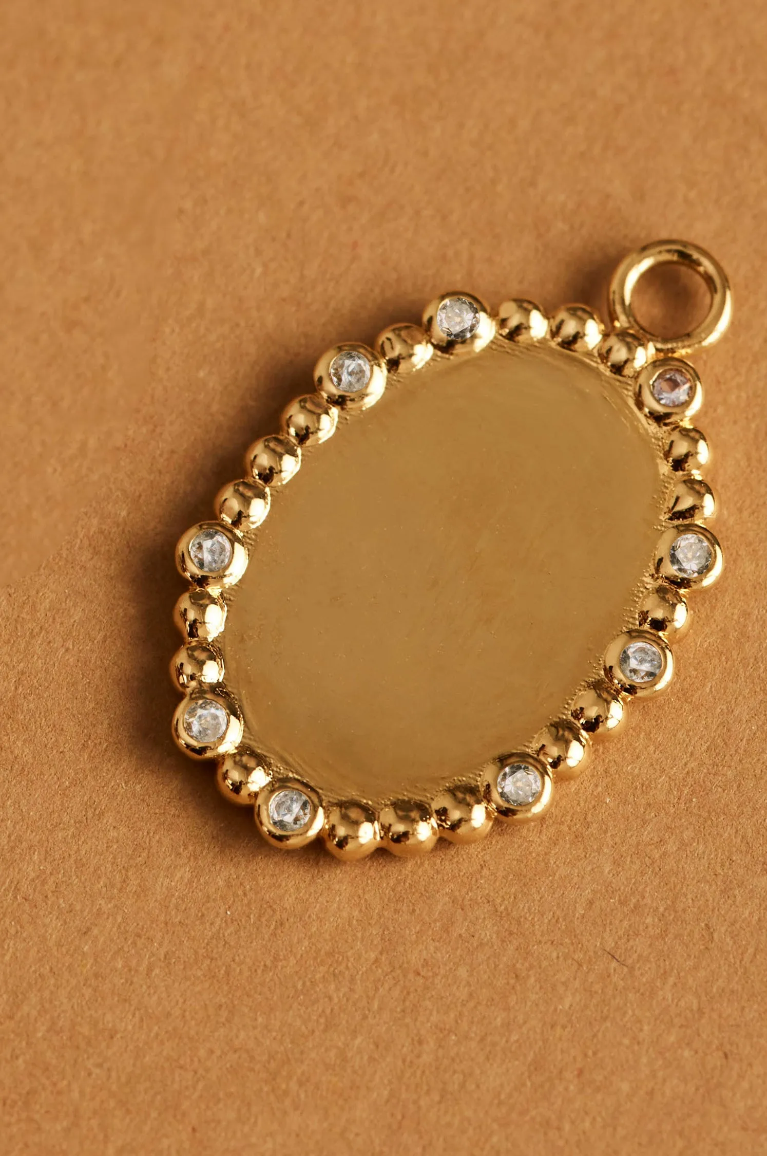 White Oval Charm sold by Apodemia