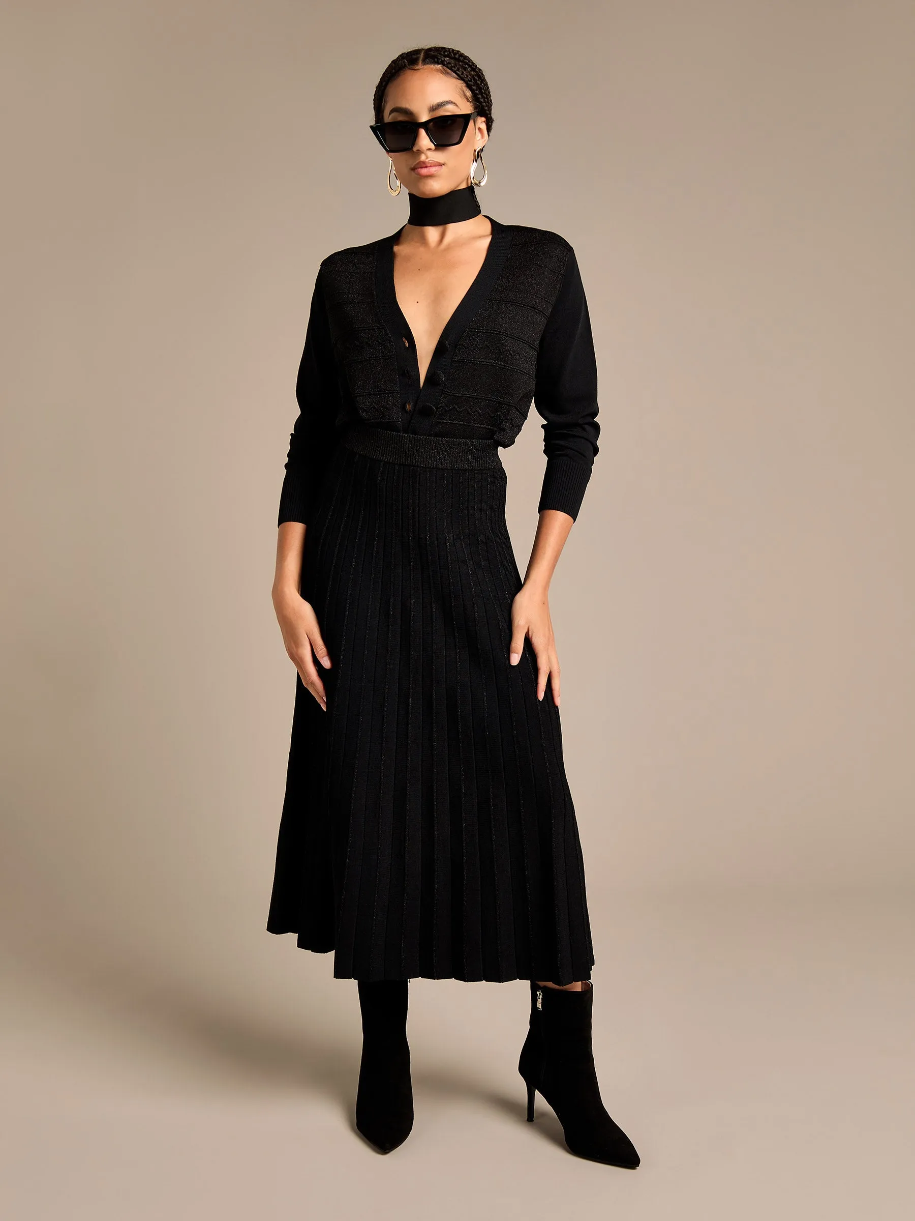 Phyllis Sparkle Cardigan and Pleated Skirt Outfit sold by George W. Davies