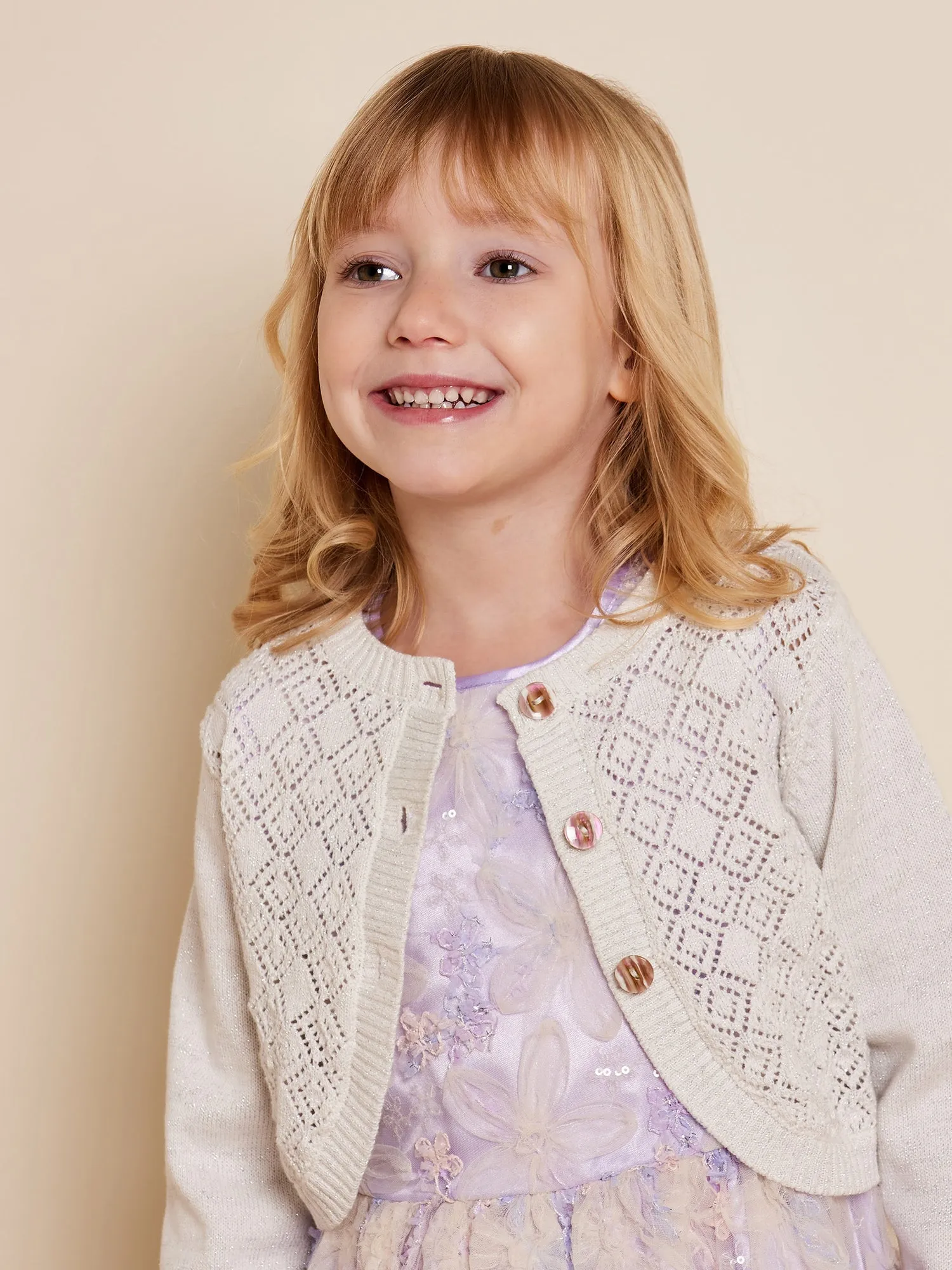 Marianne Knitted Cardigan sold by George W. Davies