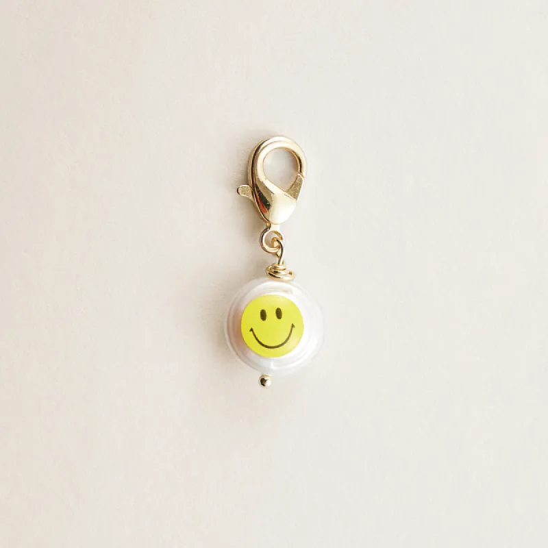Mother of Pearl Happy Face Charm sold by Parker Thatch