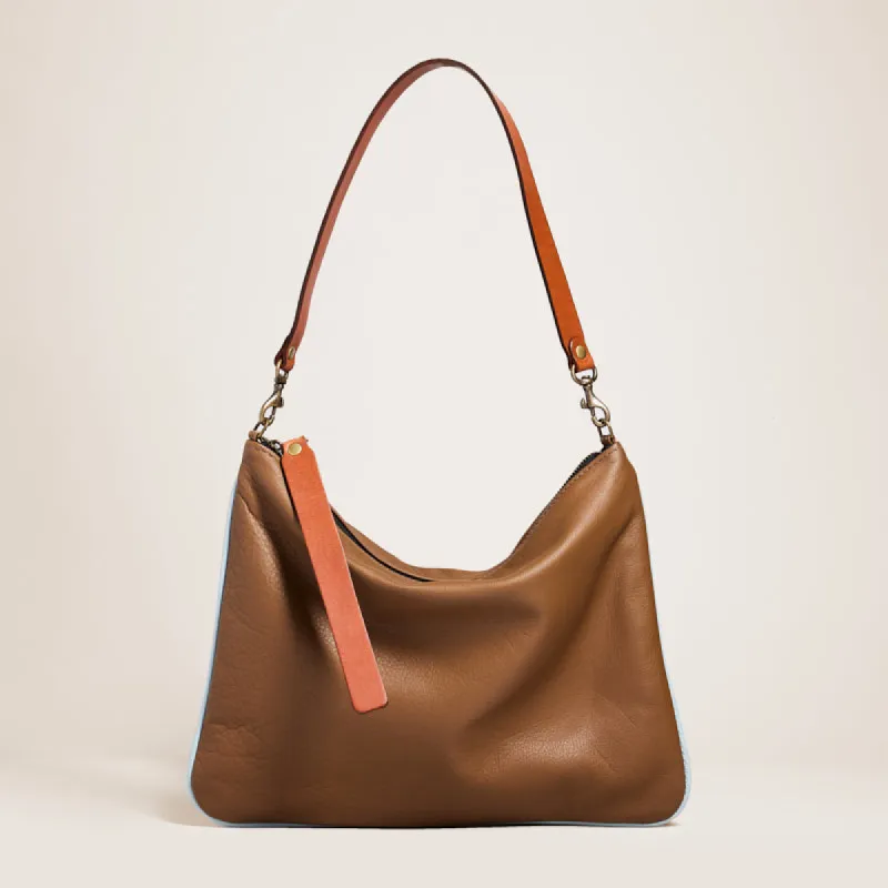 Lee - Leather Luggage with Light Blue Piping sold by Parker Thatch