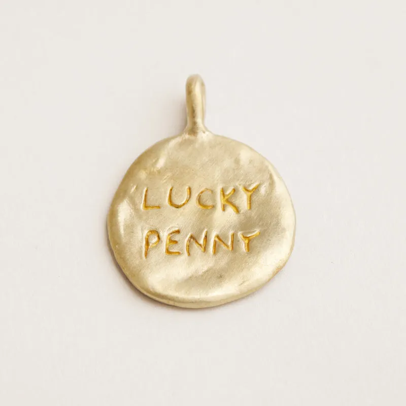 Lucky Penny Charm sold by Parker Thatch