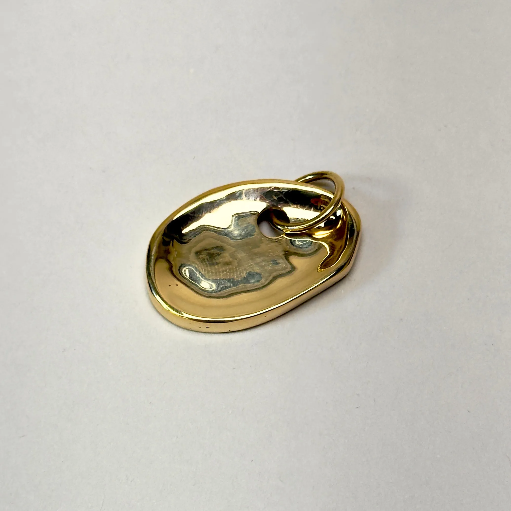 Sculptural Oblong Pebble Pendant Charm sold by Parker Thatch