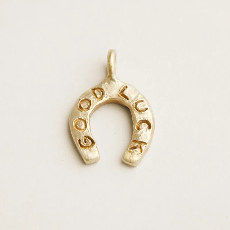 Lucky Horse Shoe Charm sold by Parker Thatch