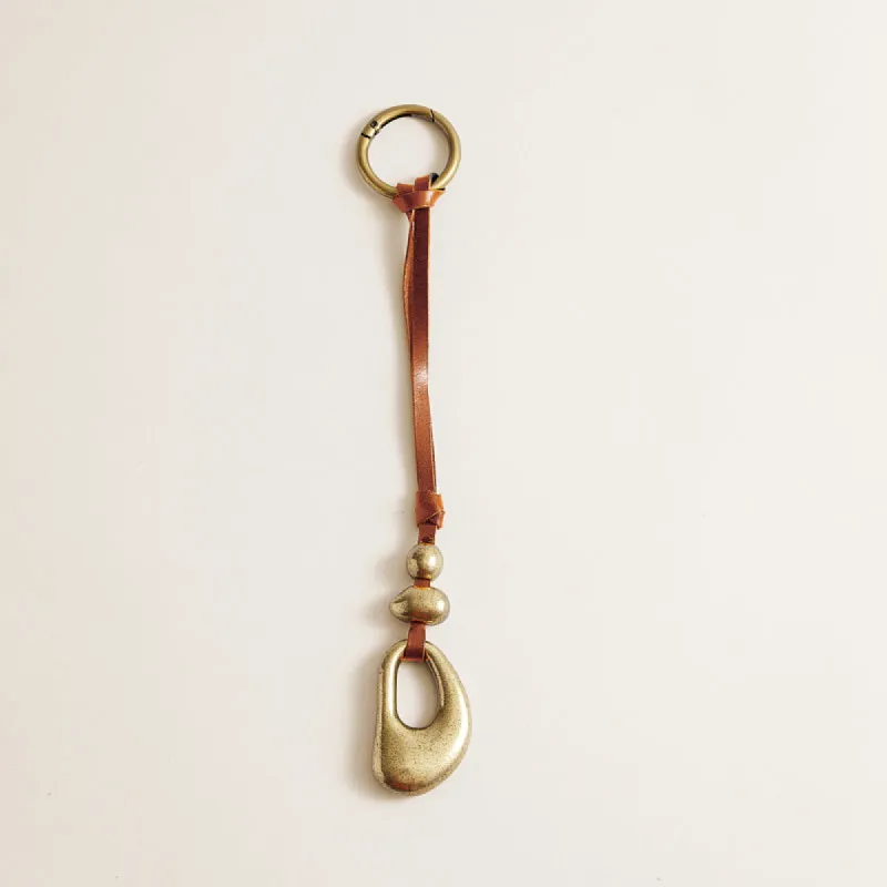 Stacked Pebble Bag Charm - Cognac sold by Parker Thatch