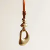 Stacked Pebble Bag Charm - Cognac sold by Parker Thatch