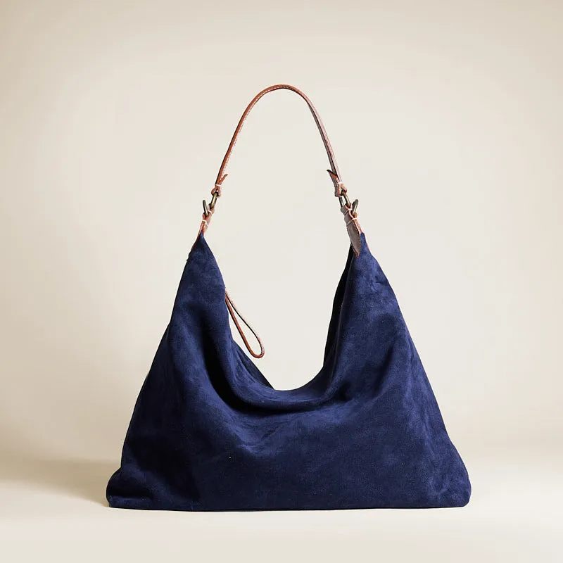 Maurice Hobo - Suede Navy sold by Parker Thatch