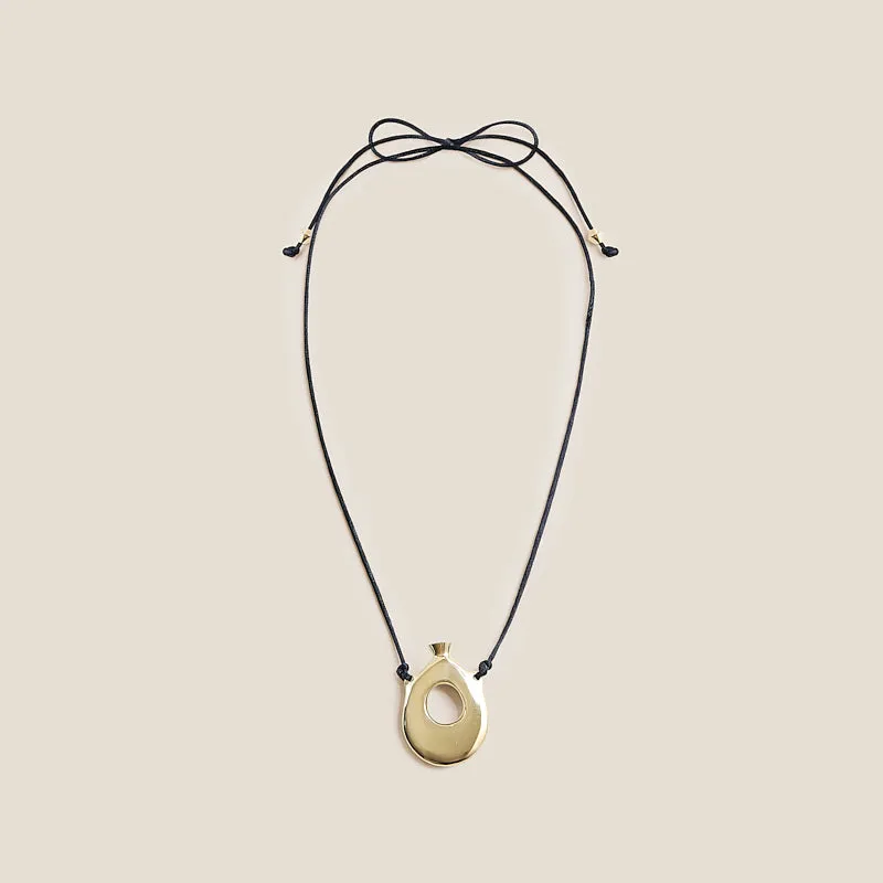 Vessel Pendant Necklace with Black Satin Cord sold by Parker Thatch