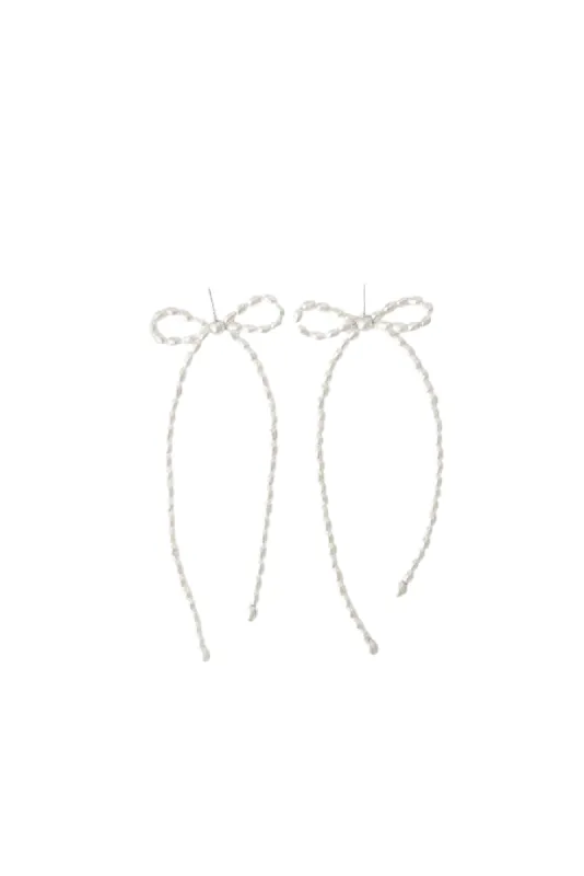 Margot Earrings in Rice Pearl sold by The Jewelry Edit
