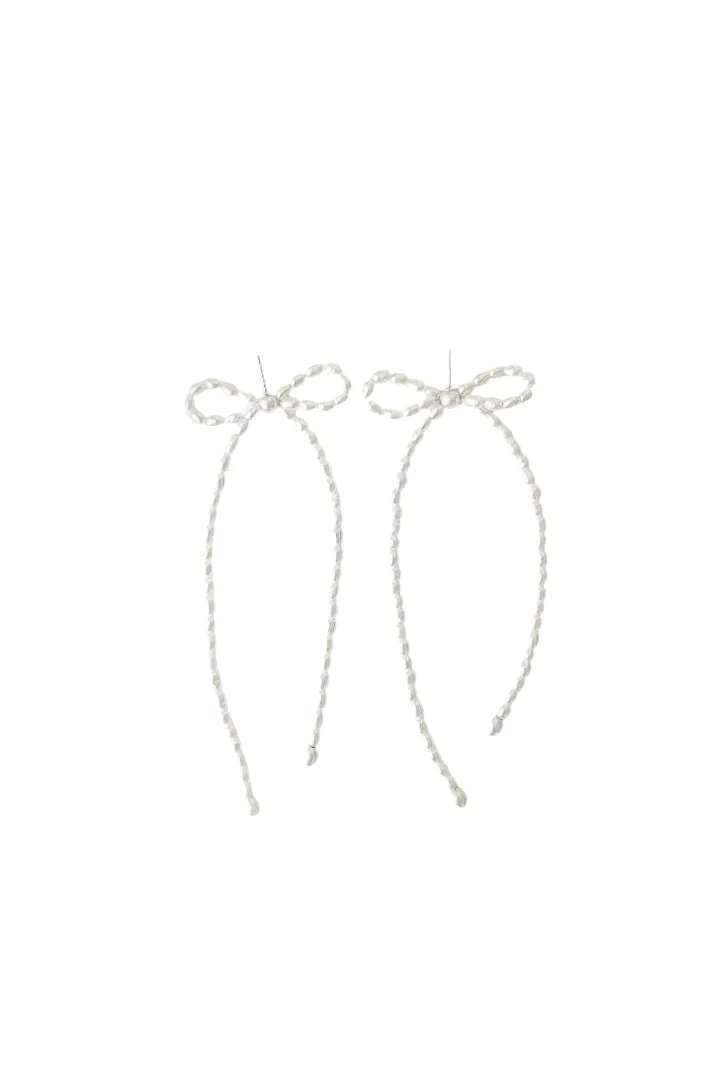 Margot Earrings in Rice Pearl sold by The Jewelry Edit