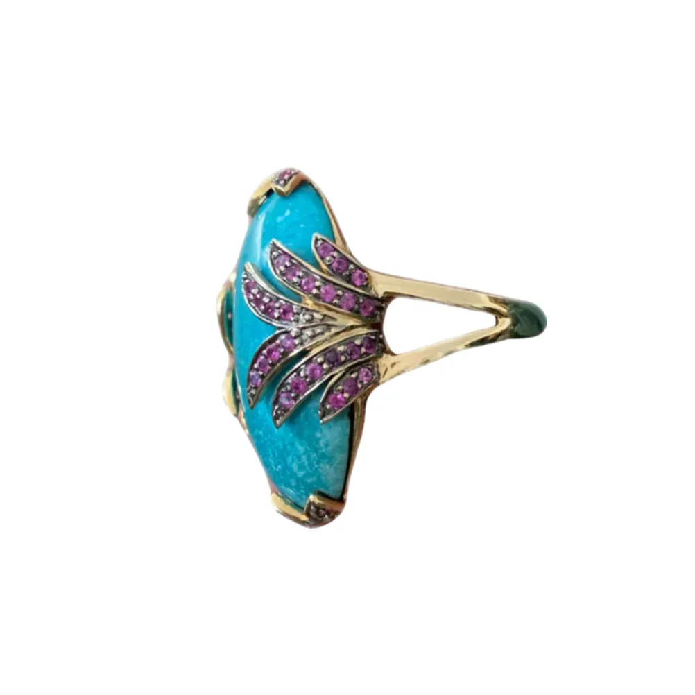 Bold Oval Turquoise and Ruby Cocktail Ring sold by The Jewelry Edit