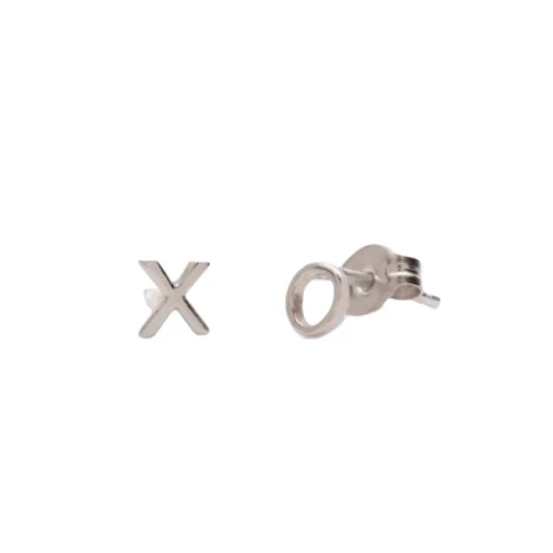 Tiny 'X O' Studs sold by The Jewelry Edit