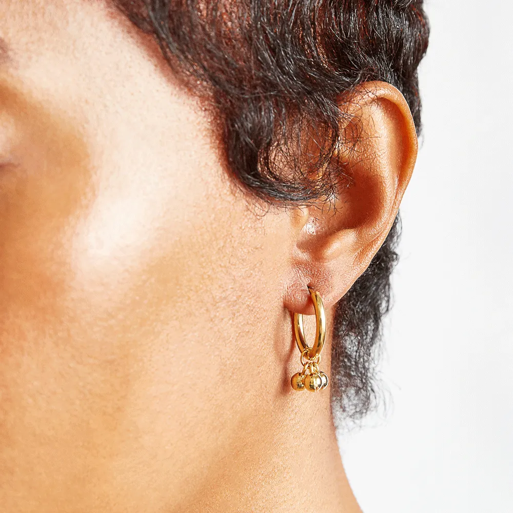 Gold Ball Charm Huggies sold by The Jewelry Edit product image thumbnail 2