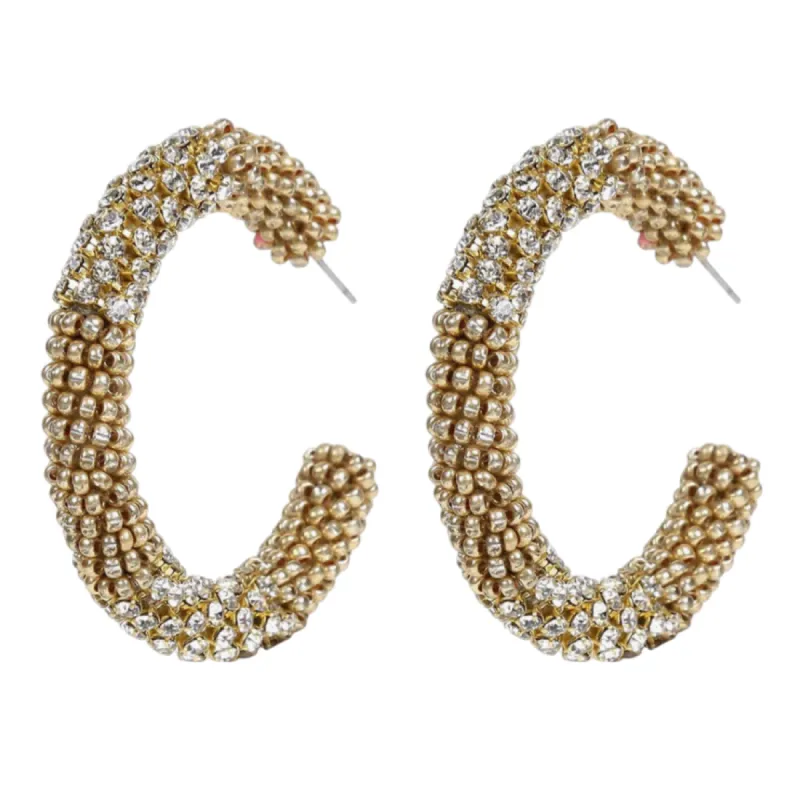 Lana Hoops Gold sold by The Jewelry Edit