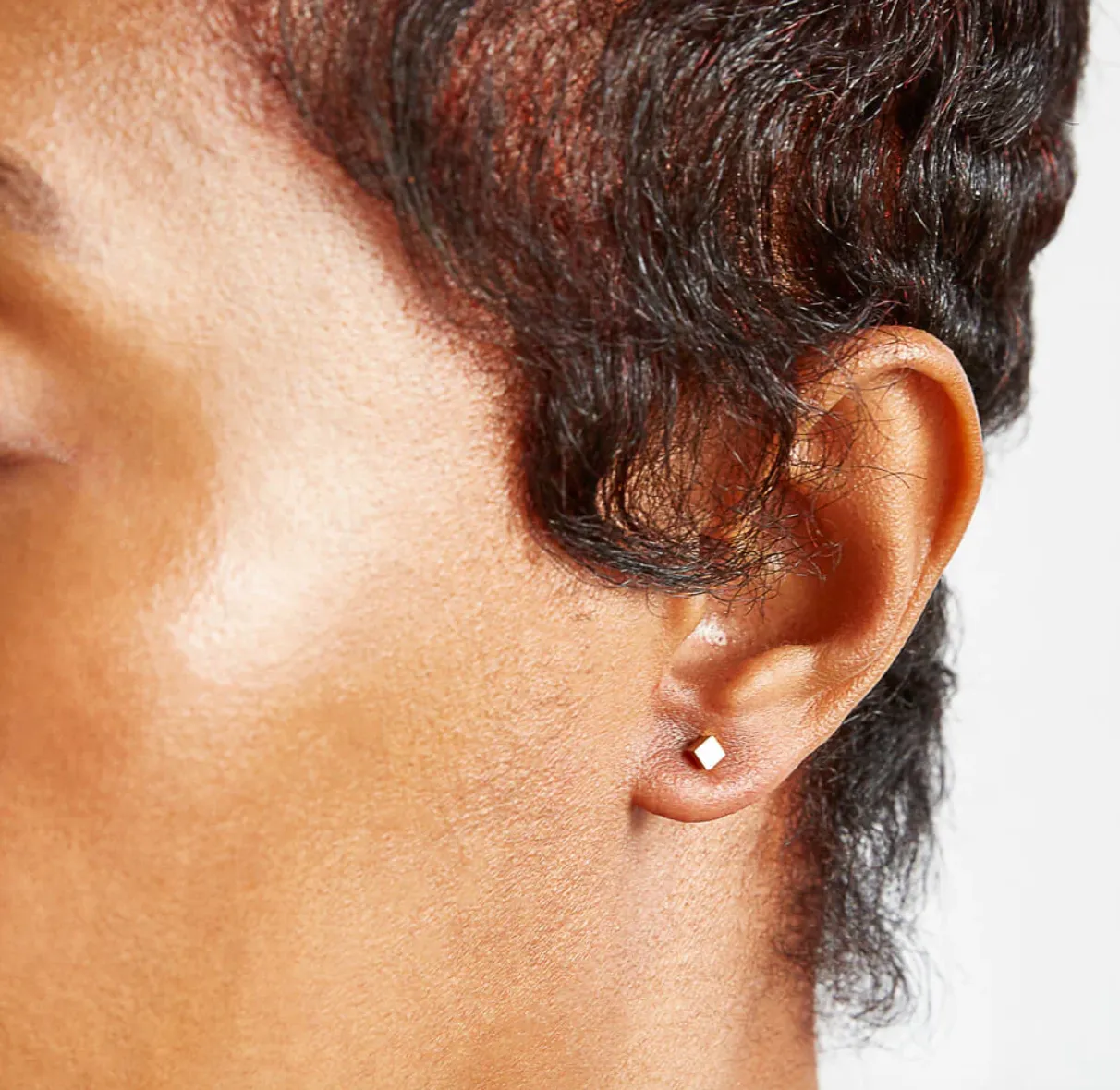 Tiny Gold Cube Studs sold by The Jewelry Edit product image thumbnail 2