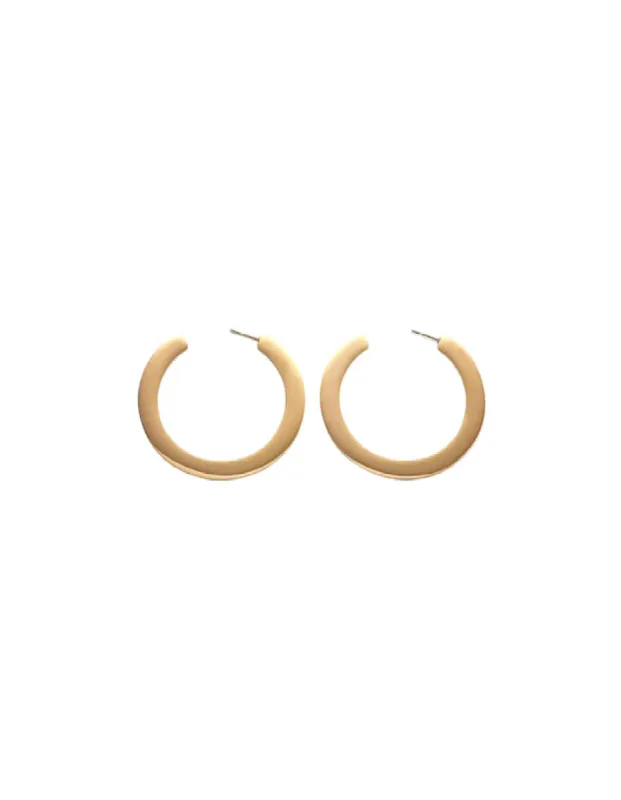 Medium Flat Hoop Earrings sold by The Jewelry Edit