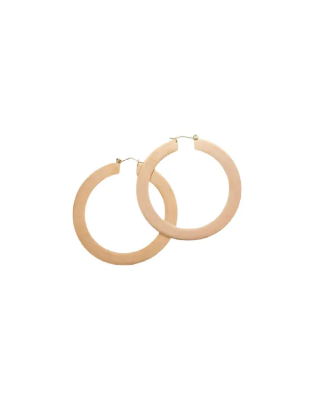 Gold Matte Large Hoop Earrings sold by The Jewelry Edit