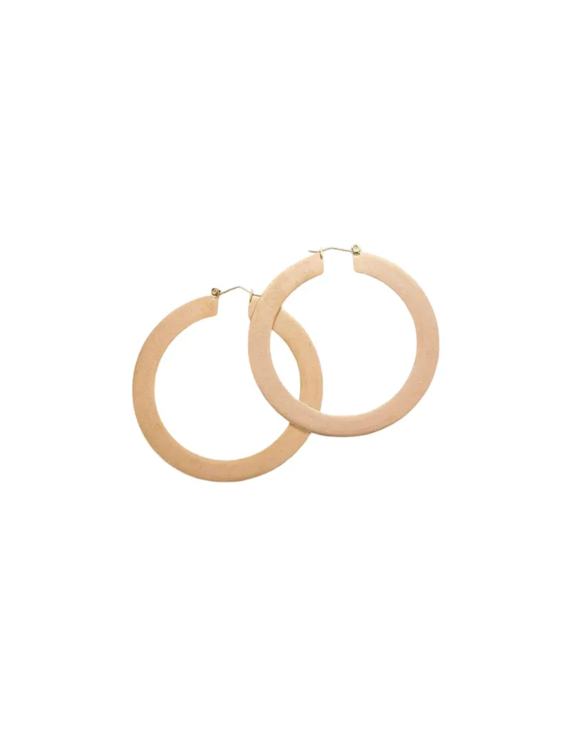 Gold Matte Large Hoop Earrings sold by The Jewelry Edit