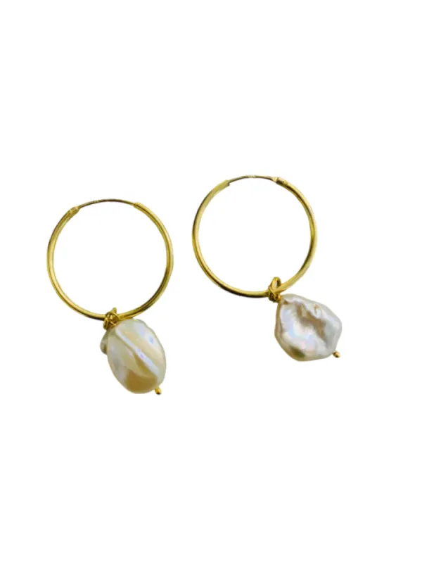 Organic Pearl Hoops sold by The Jewelry Edit