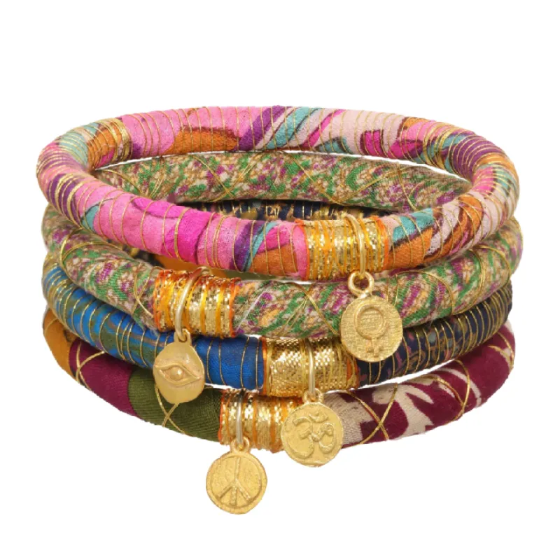 Who's Sari Now? Charm Bangles sold by The Jewelry Edit