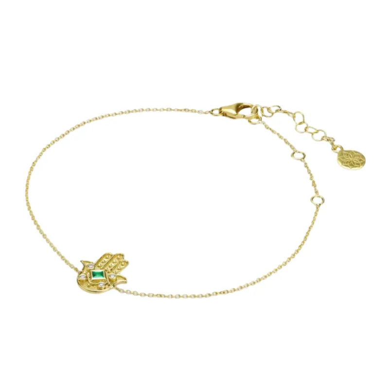 Diamond and Emerald Hamsa Bracelet sold by The Jewelry Edit