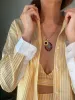 The Ellipse sold by The Jewelry Edit