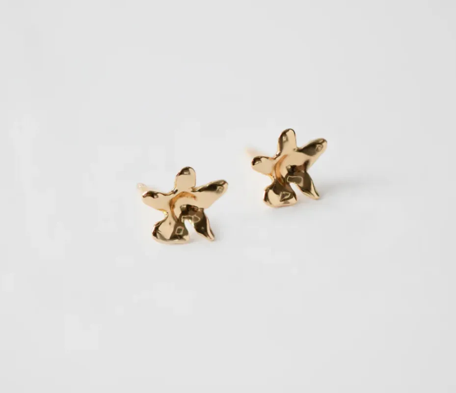 Flower Charm Studs in Gold sold by The Jewelry Edit