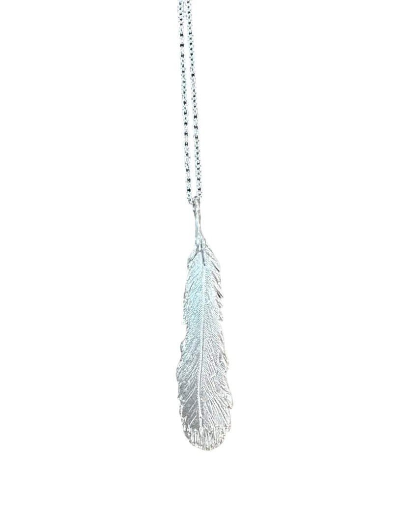 Large Silver Feather Pendant Necklace sold by The Jewelry Edit