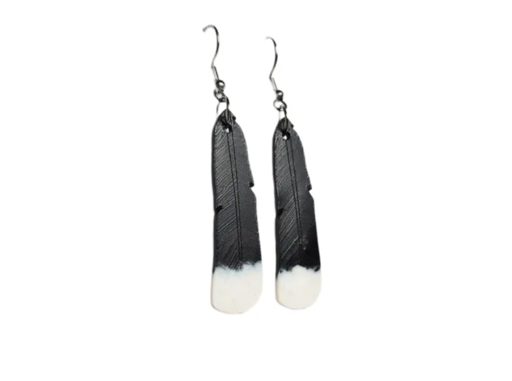 Huia Feather Earrings sold by The Jewelry Edit