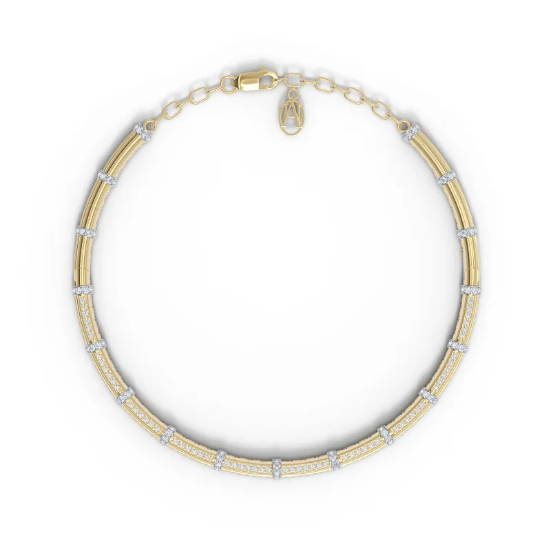 The Flute Neck Bangle sold by The Jewelry Edit