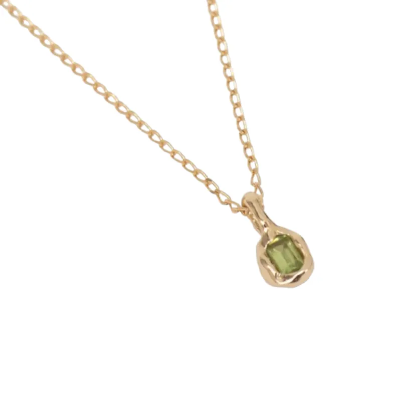 Uma Necklace in Peridot and Gold sold by The Jewelry Edit