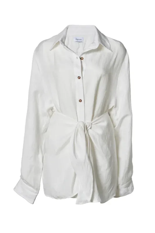 The L.A. Button Down Mini Wrap Dress White (Final Sale) sold by Curio
