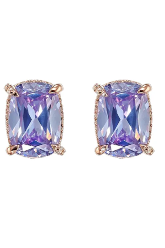 Lilac Cushion Wing Studs sold by Curio
