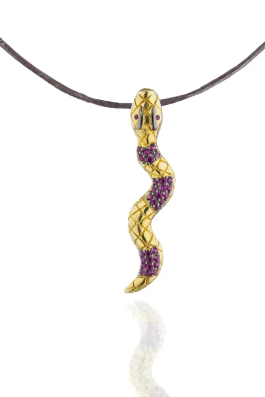 925 Silver Snake Pendant Plated in 18k YG Black Rhodium with Ruby Pave sold by Curio