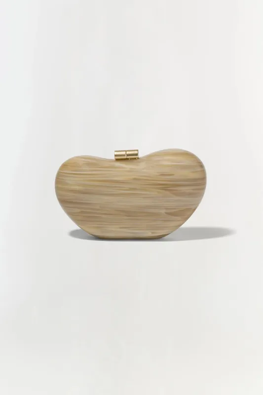 Shadow Horn Clutch sold by Curio