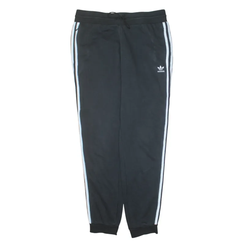 Adidas Black Joggers Women’s Large Trefoil Logo Side Stripes Cuffed Sweatpants sold by Vintage Club