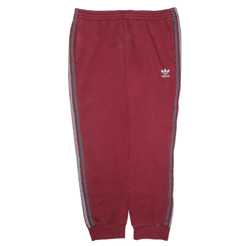 Adidas Burgundy Red Joggers Men’s XLarge Embroidered Trefoil Logo Cuffed Three Stripe Sweatpants made by Adidas