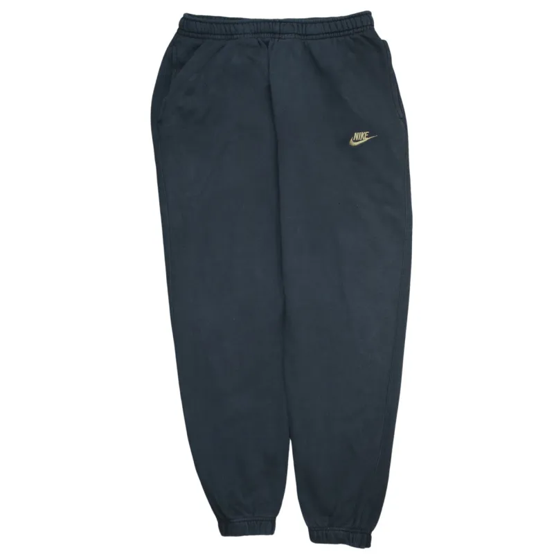 Nike 90's Swoosh Casual Joggers / Sweatpants Large Black sold by Vintage Club