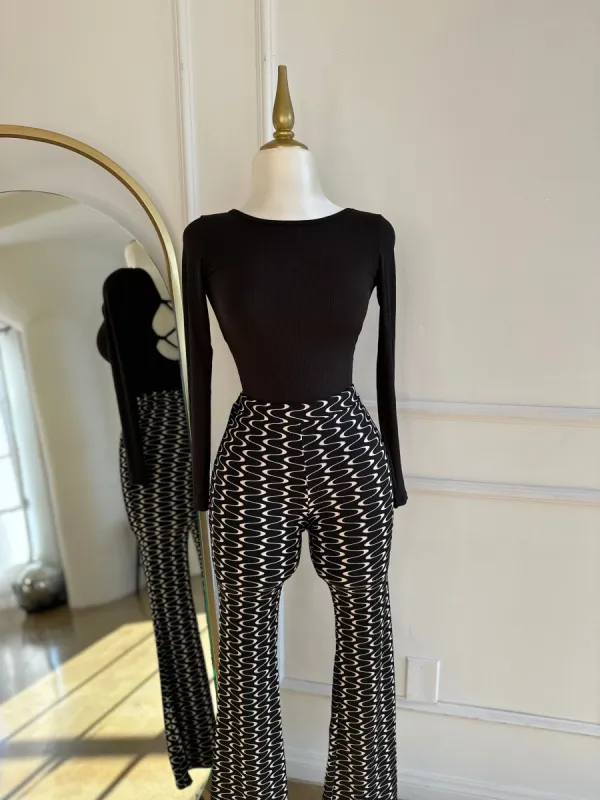 Tommy Bodysuit sold by Valemi Boutique