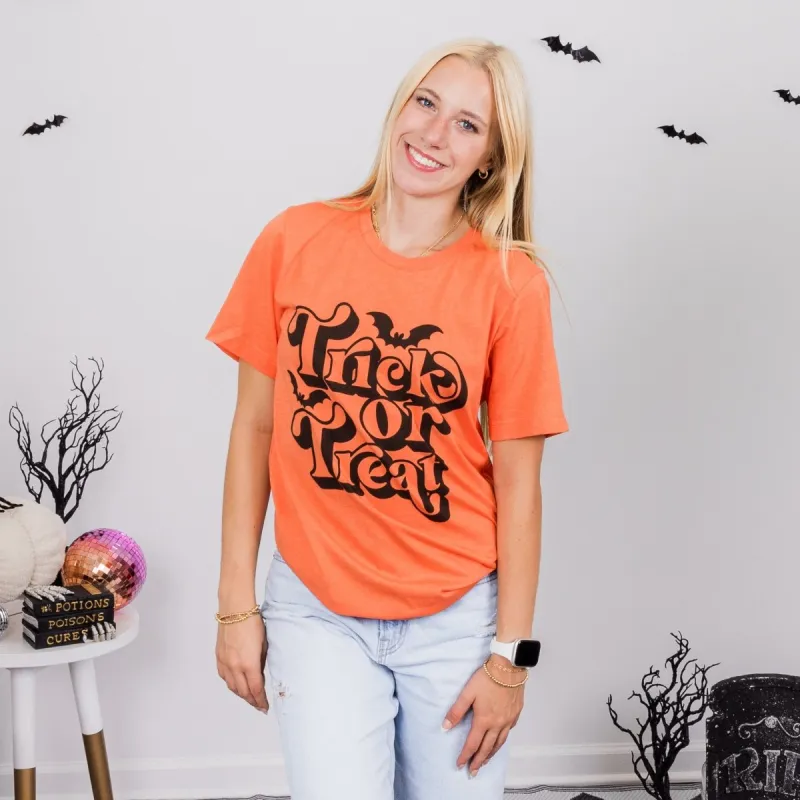Trick Or Treat Bella Graphic Tee sold by Roxie’s Picks