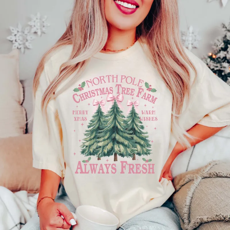North Pole Christmas Tree Farm Comfort Color Graphic Tee sold by Roxie’s Picks